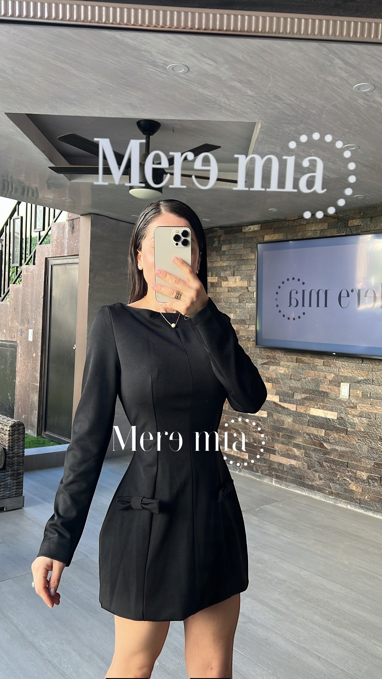 Vestido negro bolsas corto