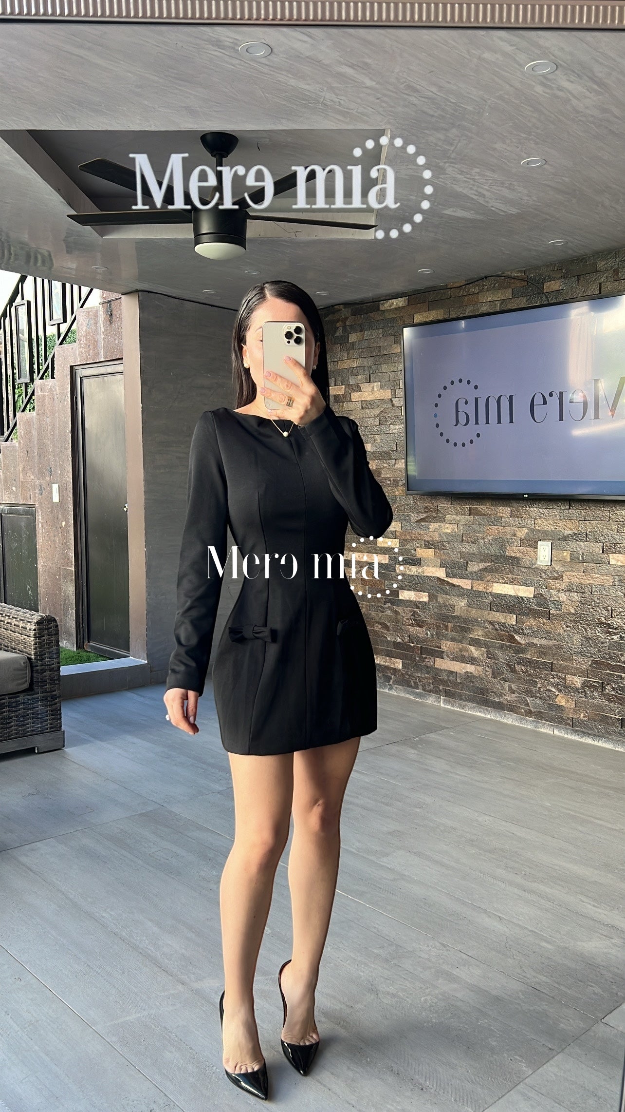 Vestido negro bolsas corto