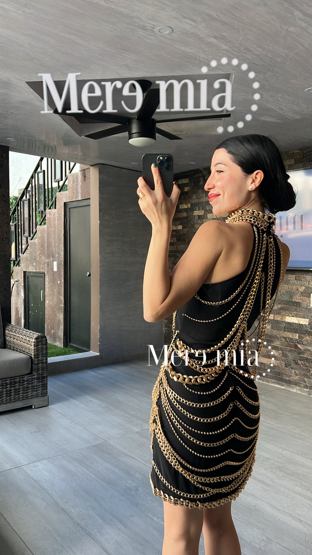 Vestido negro cadenas